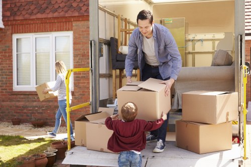 Commercial moving van loading office equipment