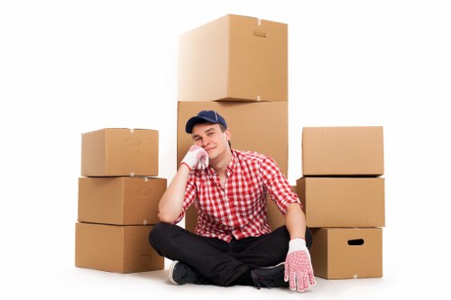 Satisfied clients with moving vans